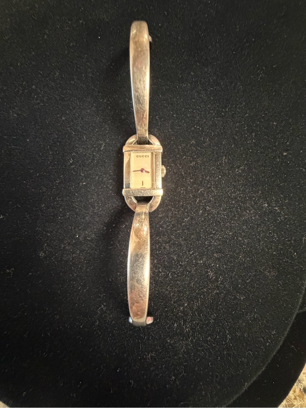 Gucci Silver-Tone Bangle Watch.